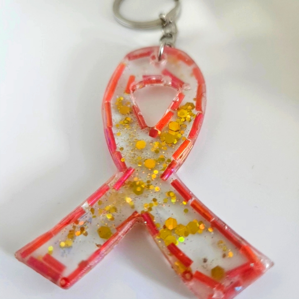 Red long bead and gold glitter resin ribbon Keychain.